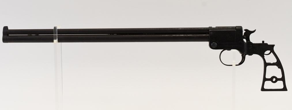 Marble's Model 21 Game Getter Combination Pistol: Marble's Model 21 "Game Getter" over & under combination pistol in .22 (upper barrel) & .44 caliber (lower barrel). The pistol has a 18" barrel and is in good condition with use wear and some surface 