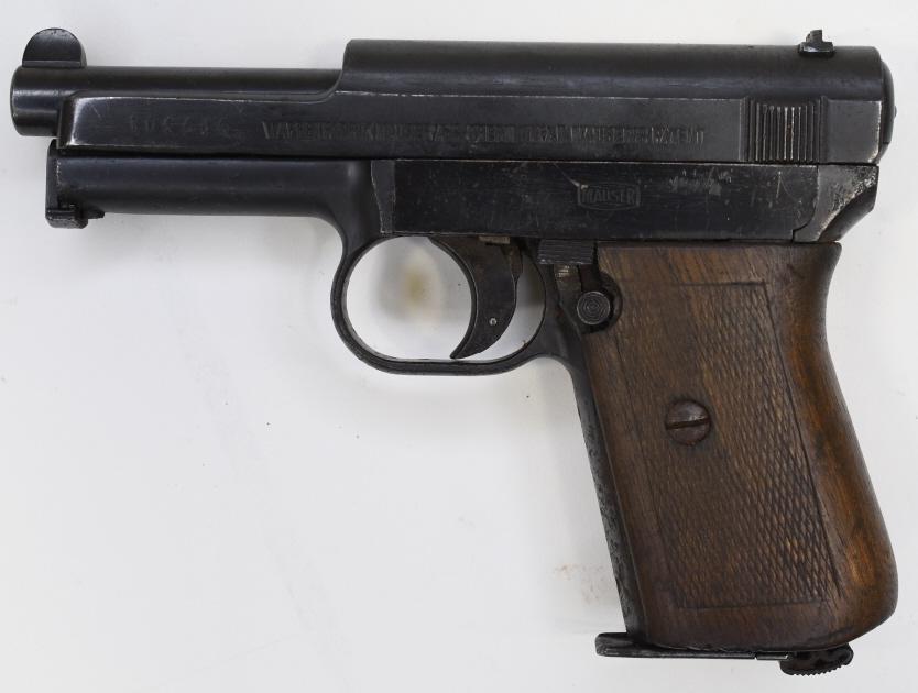 Mauser M1914 7.65mm Semi-Automatic Pistol: Nice Mauser Model 1914 semi-automatic pistol in 7.65mm. The pistol has a 3.5" barrel and is in good condition with the original wood wrap around grip. SN:105486. FFL required for transfer. (22-3) (43)