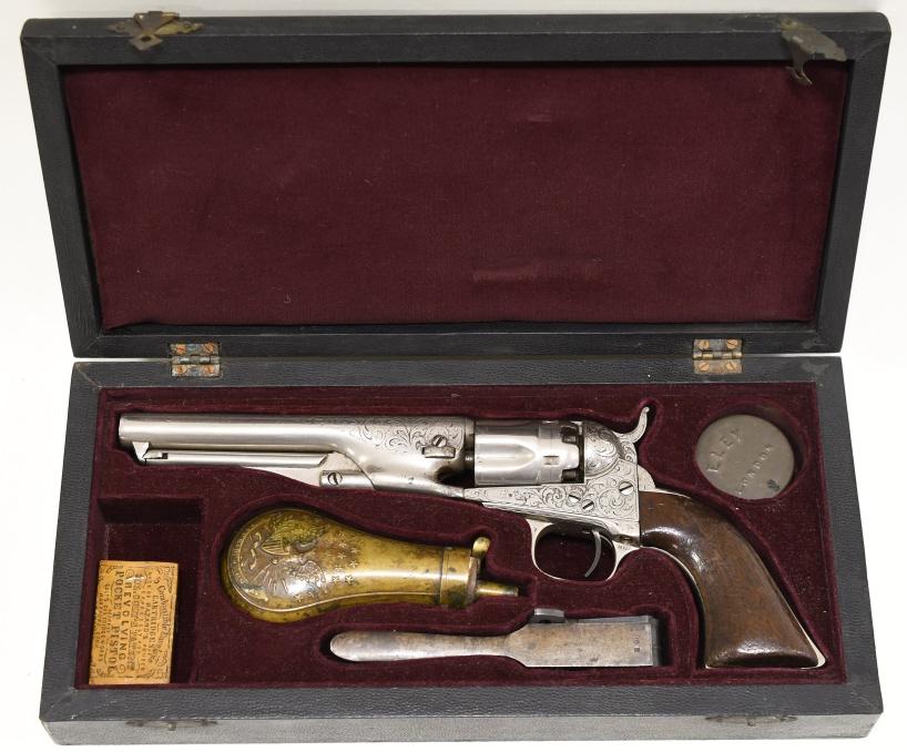 Colt Model 1862 Police .36 Cal. Revolver In Case: Nice Engraved Colt Model 1862 Police in Navy .36 caliber 5-shot revolver. The revolver comes cased with mold & flask. Manufactured in 1863 and is in good condition with expected age wear. Has a nickel