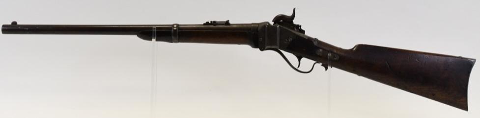 Civil War Sharps New Model 1863 Cavalry Carbine: Nice example of a Civil War Sharps New Model 1863 Cavalry Carbine. The breech loading single shot percussion .52 caliber carbine has a 22" round barrel and is in good used condition with use wear. SN: