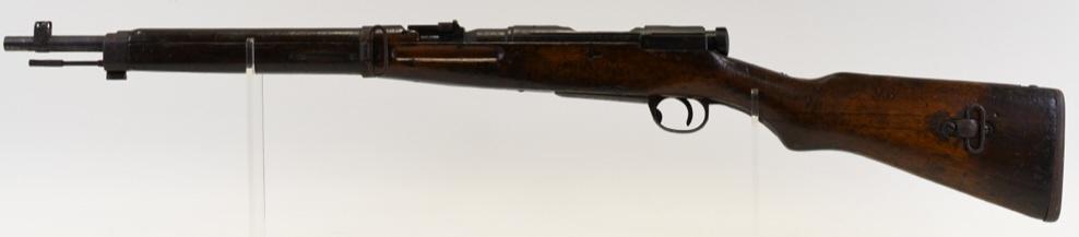 Japanese Arisaka T38 Bolt Action Carbine: Japanese Arisaka T38 bolt action carbine in 6.5mm. The carbine has a 19.5" barrel, intact mum, cleaning rod, and is in good used condition with wear. Made at the Nagoya Arsenal. SN:6087. FFL required 