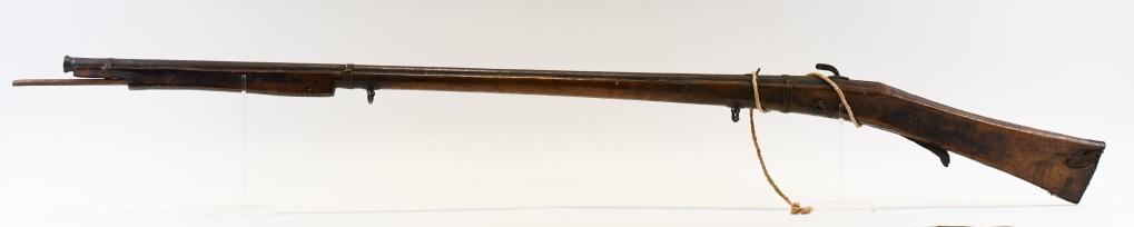 18th-19th Century Torador Matchlock Musket: 18th-19th century Indian/Asian/Middle Eastern Torador Matchlock Musket. Functions, and has a 47.5" barrel and leather cheek rest.