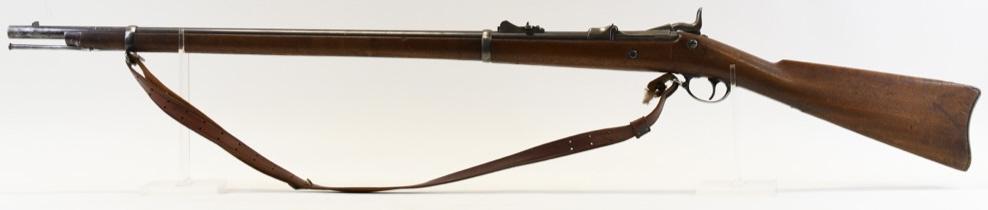 Springfield Model 1873 Trapdoor Rifle: Springfield Model 1873 Trapdoor rifle in .45-70 caliber. The rifle functions well and is in very nice used condition. Rifle comes with full metal ramrod and sling. Barrel measures 32.5" long. SN:21930