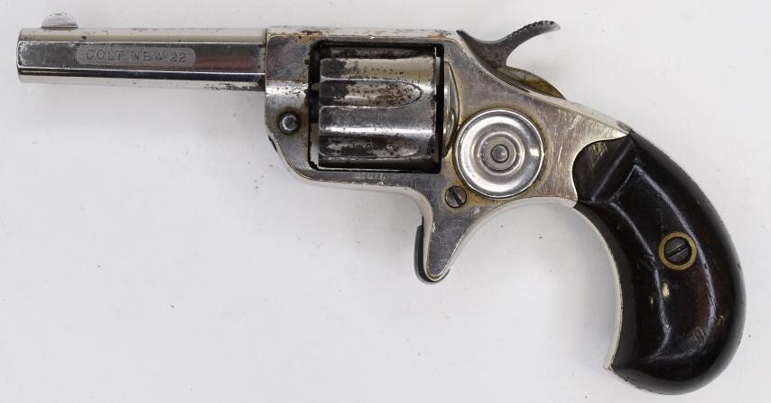 Colt New 22 .22 Cal. Seven-Shot Revolver: Nice older Colt seven-shot revolver in .22 caliber. The nickel finish revolver has a 2" barrel and is in good condition with wear. SN:15682. FFL required for transfer. (834-2)