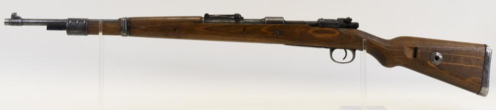 WWII German Mauser Model 98 8mm Rifle: Nice WWII 1944 German Mauser Model 98 8mm Bolt Action Rifle. The rifle has a 24" barrel and is in good condition with some deep scratches to the wood stock. Has Nazi Eagle proof marks and acceptance m