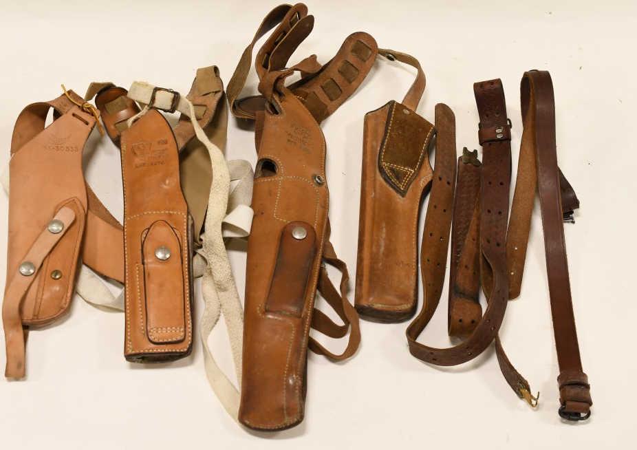 Lot of Four Leather Holsters Plus Straps: Lot of four mixed leather holsters and leather straps. Brands include Safariland, Bianchi, and Hunter.