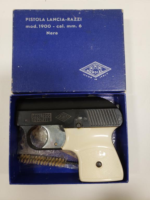 Italian Mondial Model 1900 22 Cal. Tear Gas Pistol: Nice in box Italian made Mondial Brevettata Model 1900 22 Cal. tear gas pistol. The gun is in nice condition in the original box with cleaning tool.