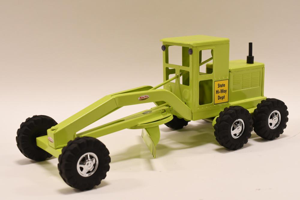 Restored Tonka State Hi-Way Dept Road Grader: Nice professionally restored Tonka State Hi-Way Department Road Grader. The bright lime green grader is in great condition. Measures approximately 20.5" long.