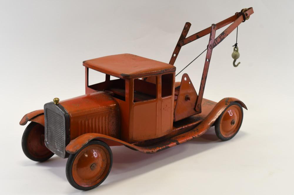Triang Wrecker Tow Truck: Nice Triang Wrecker Tow Truck. Appears to be mostly original with a few touch ups. Has some surface rust. Displays nicely with wear from play and age. Measures approximately 20.5" long