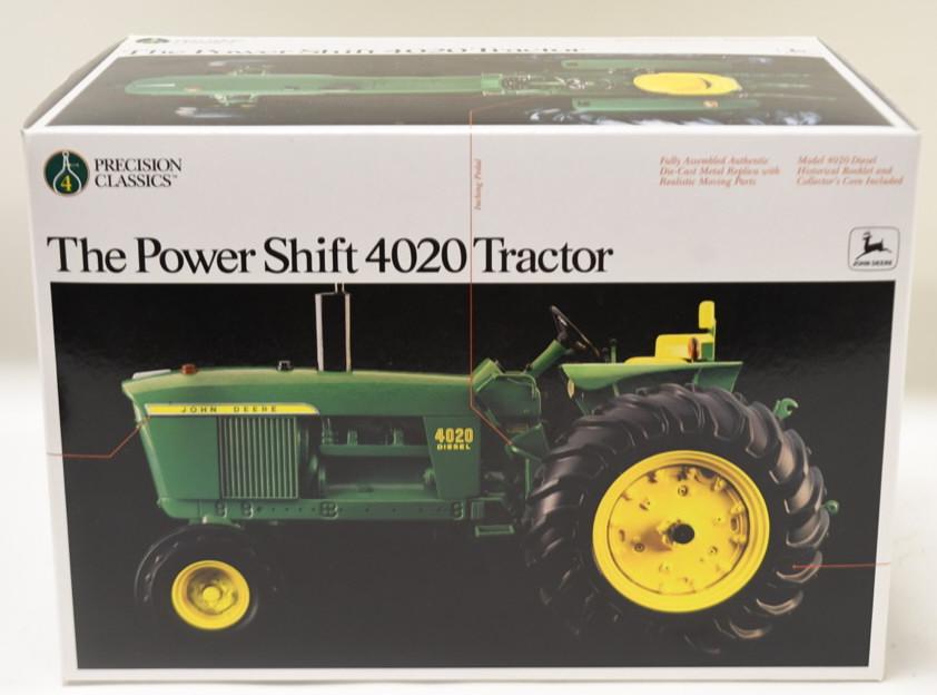 1/16 Ertl John Deere Power Shift 4020 Precision: Nice 1/16 scale die-cast Ertl John Deere Power Shift 4020 wide front precision tractor. The styrofoam is sealed shut. It includes the precision #4 pamphlet. Box is in nice condition.