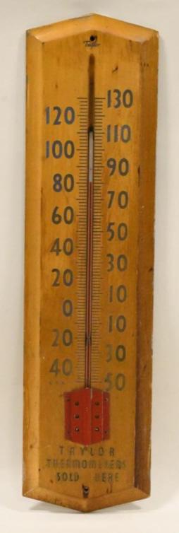 Wood Taylor Thermometers Sold Here Thermometer: Nice original wood Taylor Thermometers Sold Here Thermometer Sign. The thermometer glass is broken, the sign shows some surface wear and has some fading. Measures 28.5" tall x 7.5" across.