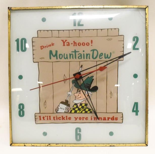 Mountain Dew Lighted Advertising PAM Clock: Nice lighted Mountain advertising PAM clock. Clock is in nice condition with light wear from use and age. Does have light surface rust on can and a crack to the outer bubble glas. Has reproduction Mou