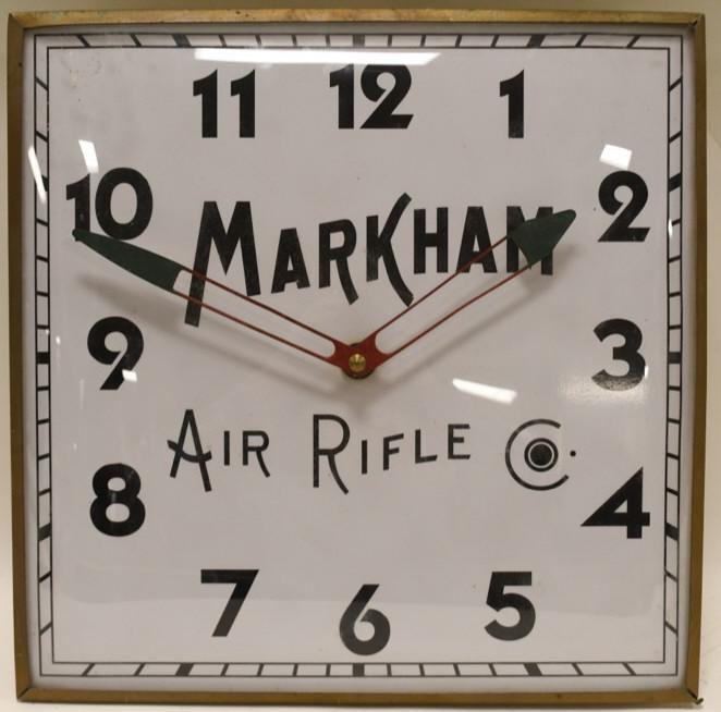 Markham Air Rifle Advertisign Lighted Clock: Nice Markham Air Rifle advertising lighted clock. Nice condition with wear from age and display. Works well. Displays well with convex outer glass. Measures approximately 15" across by 15" tall.