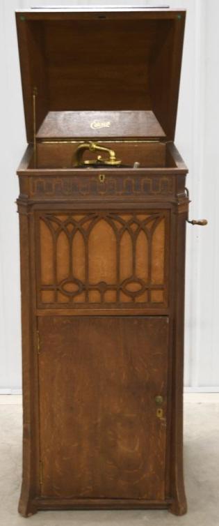 Antique Edison Disc Phonograph Model C250: Nice antique Edison "Disc" floor model phonograph model C250. Very nice cosmetic condition with some wear to the oak veneer. It measures approximately 51" tall by 21" across by 21" wide