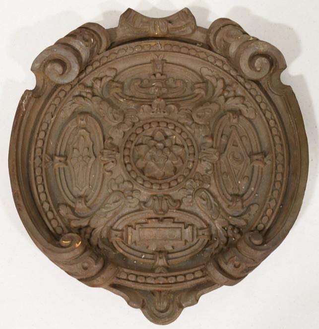 Antique Cast Iron Architectural Pediment: Very nice antique cast iron ornate architectural pediment. Displays very well with ornate flower motif. It measures approximately 17-1/2" in diameter.