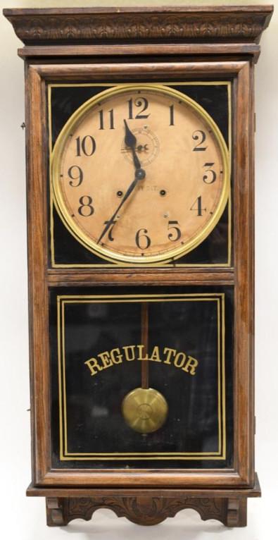 Waterbury 30-Day Springtime Stork Wall Clock: Nice running Waterbury 30-Day Springtime Stork Wall Clock. The clock runs and has an oak case and second hand. Clock measures 36.5" tall x 17.5" across x 5.5" deep.