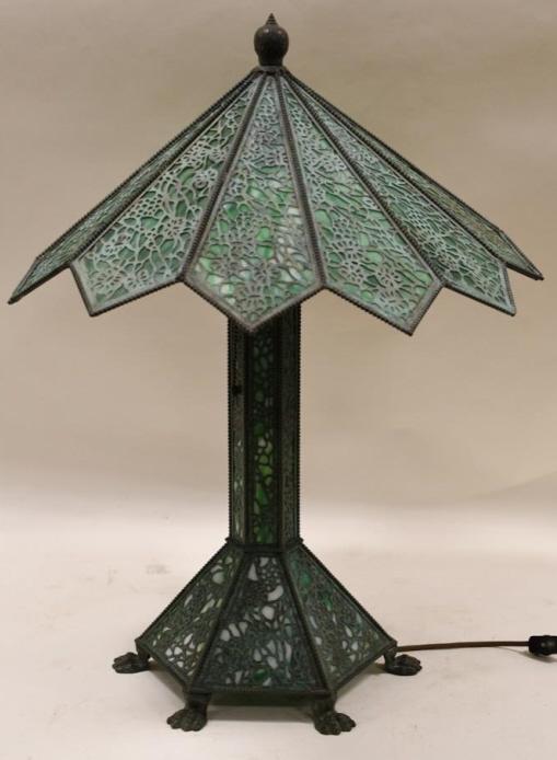Antique Riviere Studios Green Slag Glass Lamp: Beautiful antique RIviere Studios green slag glass and bronze lamp. The 12 panel lamp has a lily pad design and is in wonderful condition except for a couple cracks in two panels, no glass is missing.
