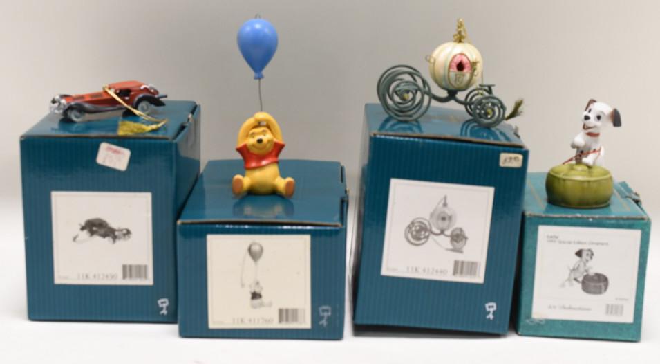 Lot Of 4 Walt Disney Classic Collection Ornaments: Nice lot of four Walt Disney Classics Collection porcelain ornaments. The lot includes Winnie The Pooh Up To The Honey Tree, An Elegant Coach For Cinderella, Cruella's Car & Lucky from 101 Dalmations.