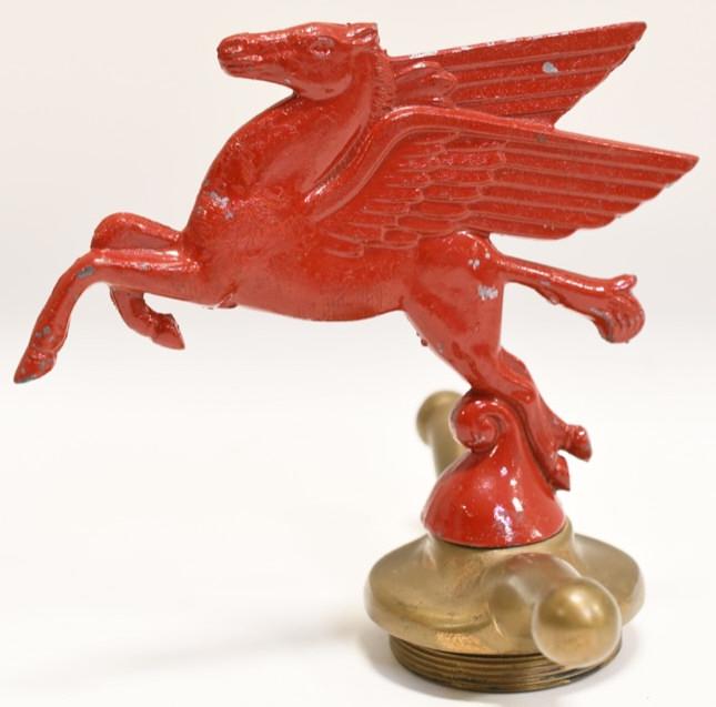 Mobil Pegasus Hood Ornament Radiator Cap Mascot: Nice Mobil Oil Pegasus hood ornament with brass dog bone style radiator cap. Nice condition with paint loss and wear. It measures approximately 5-1/2" tall by 5-1/4" across. REF#4