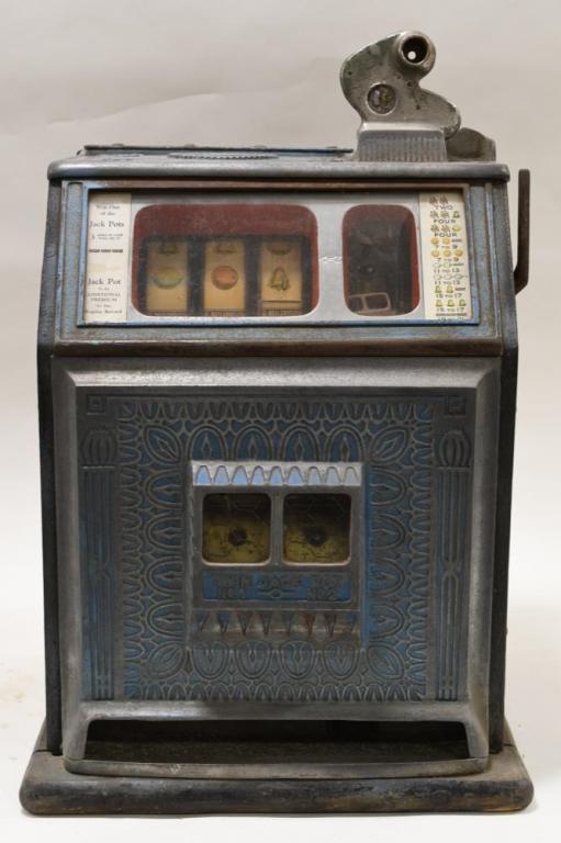 Watling Bell Fruit Gum Vendor 1¢ Slot Machine: Nice Watling 1¢ Bell Fruit Gum Vendor twin jack pot slot machine. Machine is in fair cosmetic condition with wear from use and display. Works okay. Measures approximately 24" tall by 16" across by 15