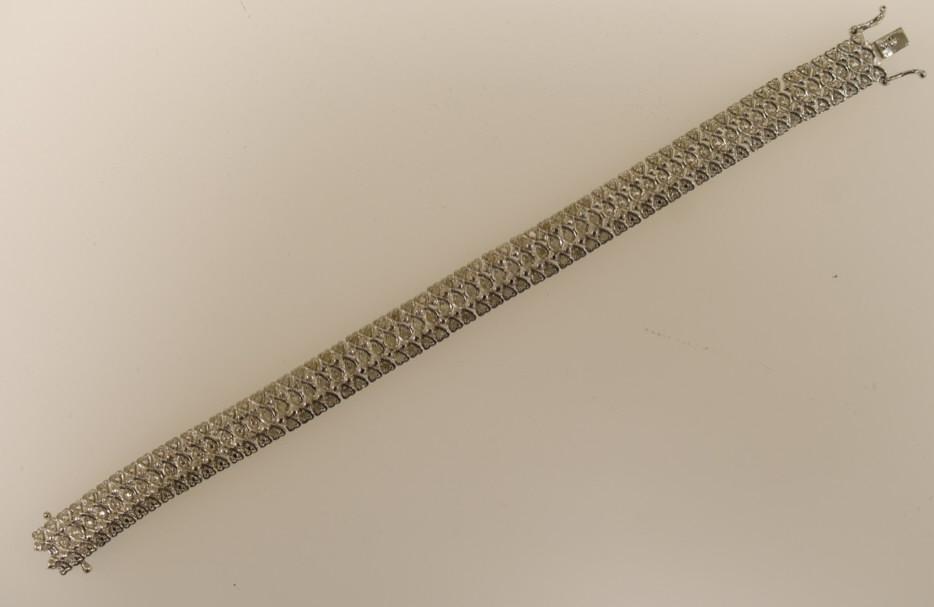 1CT DIAMOND TENNIS BRACELET: STERLING SILVER 23.9 GRAMS