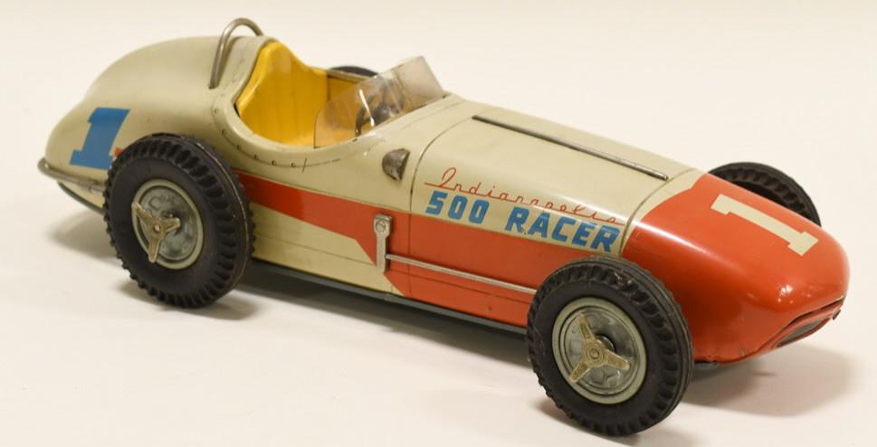 Japan Tin Litho Friction Indianapolis 500 Racer: Nice tin litho friction Sears Exclusive Indianapolis 500 Racer. Nice condition with light wear from use and age. Comes with original box. Box has wear from age and dispay. Toy displays extremely well 