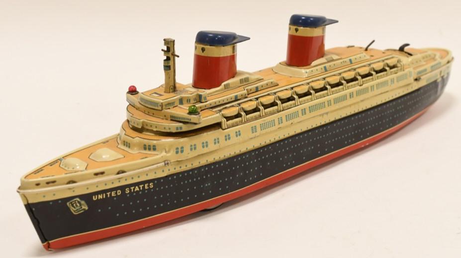 Yonezawa Tin Litho Battery Op. U.S. Ship: Nice Yonezawa tin litho battery operated United States S.S. ship. Displays nicely with paint loss and wear from play and age. Toy is untested. Measures approximately 18 1/2" long.