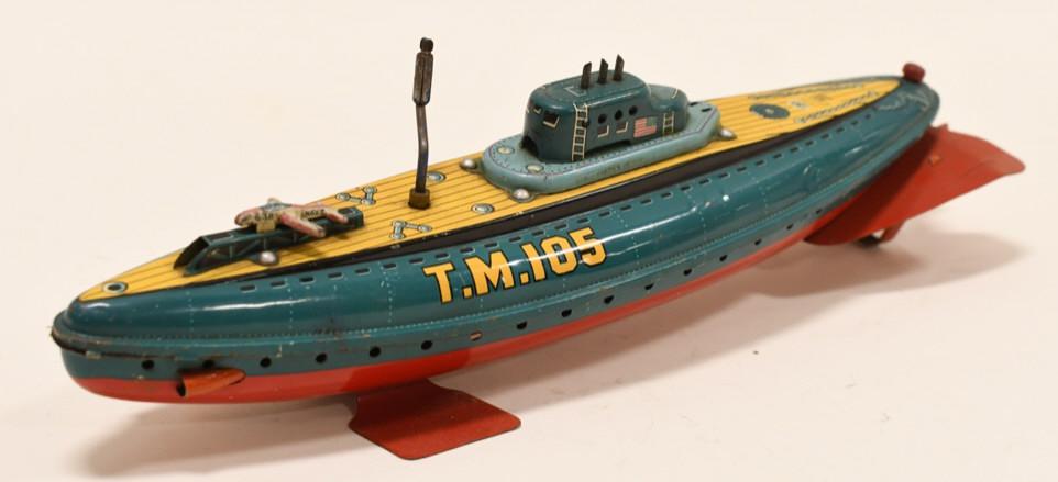 Modern Toys Tin U.S. Navy T.M.105 Submarine: Nice Modern Toys tin litho U.S. Navy T.M. 105 Submarine windup. Displays nicely wear and paint loss from play and age. Working condition. Measures approximately 14 1/2" long.
