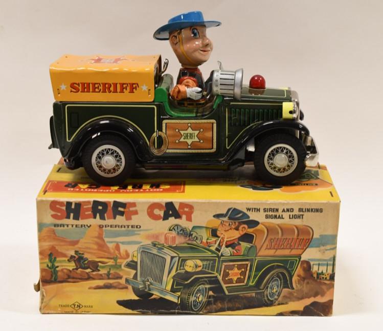 Showa TN Tin Litho Battery Operated Sheriff Car: Nice Japan Showa TN tin litho battery operated sheriff car in the original box. The car is in nice condition with light wear from age. Displays very nicely with good color. Toy is untested. Measures a