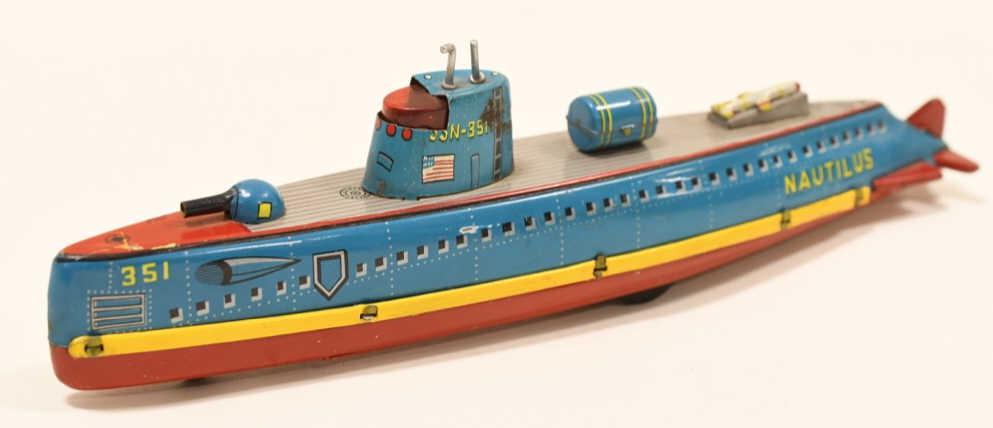 Nomura Tin Friction Nautilus Submarine SSN-351: Nice tin litho friction U.S. Navy Nautilus Submarine SSN-351. Displays nicely with wear and paint loss from play and age. Measures approximately 11" long.