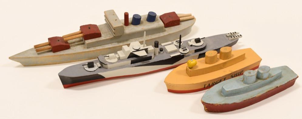 Lot of 4 WWll Wooden Toy Boats: Nice lot of four WWll wooden toy boats. All display nicely with paint loss and wear from play and age. The one has been repainted. Longest measures approximately 11 1/2" long.