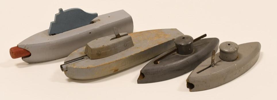 Lot of 4 WWll Wooden Toy Boats: Nice lot of four WWll wooden toy boats. All display nicely with paint loss and wear from play and age. Longest measures approximately 8 1/2" long.