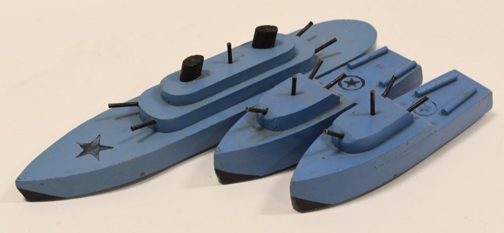 Lot of 3 WWll Wooden Ship Toys: Nice lot of WWll wooden ship toys. All display nicely with wear from play and age. All are on wheels. Longest measures approximately 13" long.