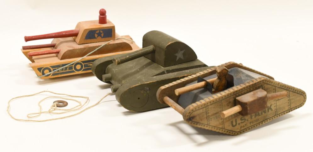 Lot of 3 WWll Wood Tank Pull Toys: Nice lot of 3 WWll wood toy tanks. Nice condition with wear from play and age. Largest measures approximately 10" long.