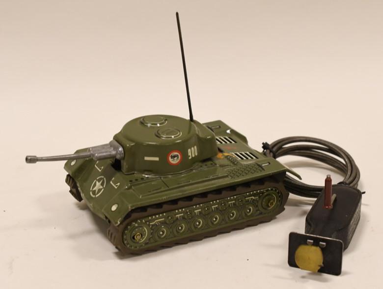 Arnold Western Germany Crank Action Tin Tank: Nice tin Arnold Western Germany crank action tank. Displays nicely with wear from age and play. Tank measures approximately 7" long.
