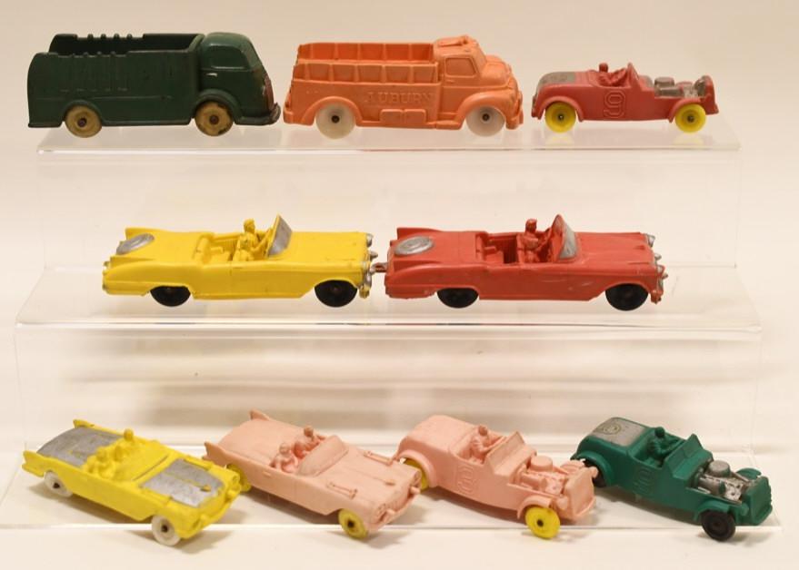 Lot of 9 Auburn Rubber Trucks and Cars: Nice lot of 9 Auburn Rubber trucks and cars. All have wear and paint loss from play and age. Longest measures approximately 6".