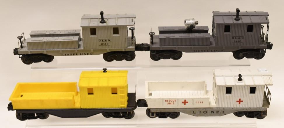 Lot of 4 Lionel Cabooses#6814, #2419, #2420, #6120: Lot includes Lionel #6814 rescue caboose (has some touchups and repairs), #2419 work caboose (has a crack by the stack), #2420 work caboose with light, #6120 yellow caboose. All have wear from age and