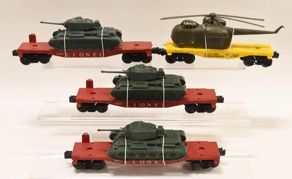 Lot of Lionel Flat Cars W/ Marx Military Loads: Nice Lionel #6825 tressel flat cars with Marx M41 tanks. Also includes 1 Lionel Union Pacific #9020 flat car with Marx possum belly copter.