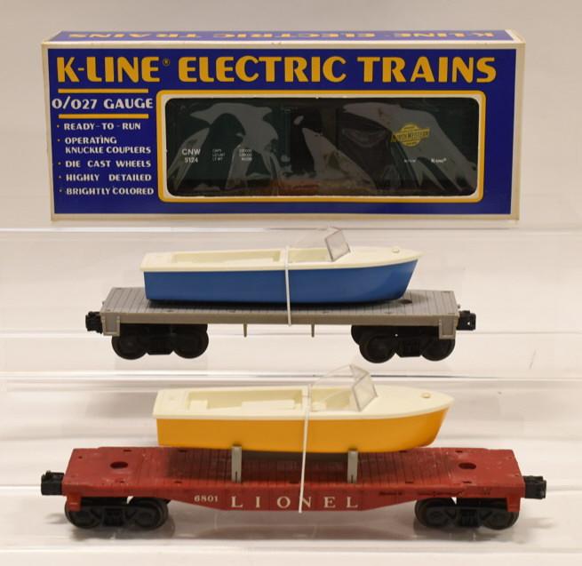 Lionel #6801 Boat Car, #6402 Flat Car #5124 Boxcar: Nice Lionel #6801-50 boat car with replacement boat, #6402 type lll flatcar with replacement boat, and #5124 K-line boxcar. Cars have wear from play and age.