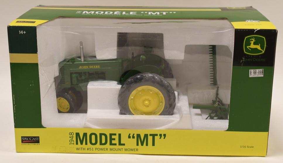 1/16 SpecCast John Deere Model MT w/ Mower: Nice 1/16 SpecCast John Deere model "MT" with #51 power mount mower. Nice condition in the box. Box has wear from display and age.