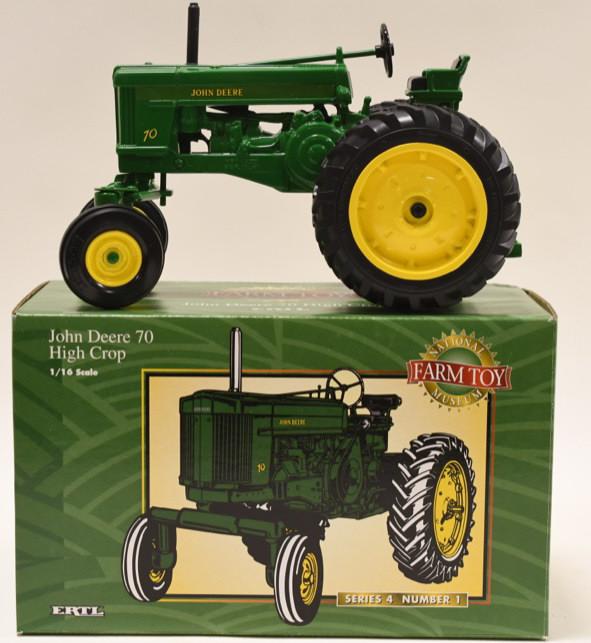 1/16 Ertl John Deere 70 Hgh Crop: Nice 1/16 Ertl John Deere 70 High Crop National farm toy museum Series 4 number 1. Displays nicely in the original box.