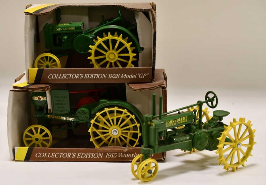 1/16 Ertl John Deere Waterloo Boy & 2 Model GP's: Nice 1/16 Ertl John Deere 1915 Model "R" Waterloo Boy and 1/16 Ertl John Deere 1928 Model "GP" Standard tractor. The box on the waterloo boy appears to have gotten damp at one time. Also comes with a
