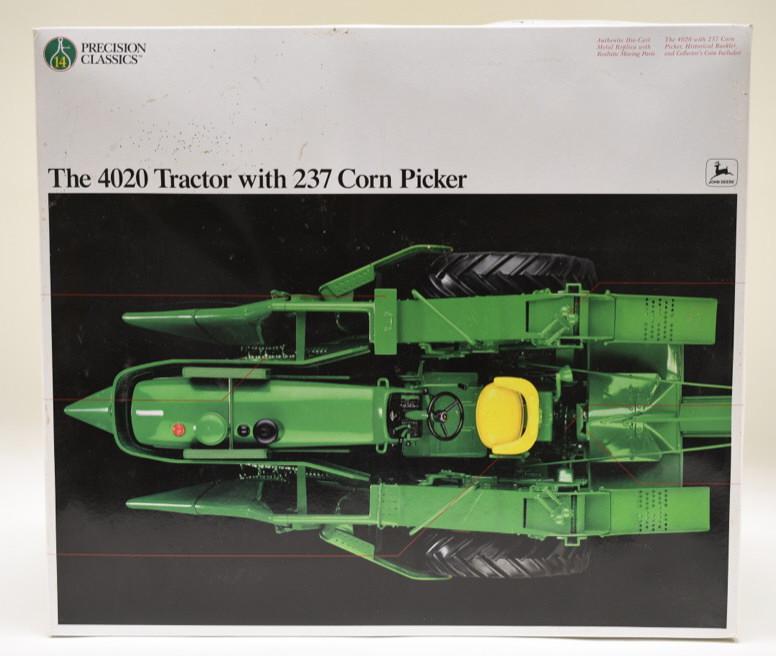 1/16 Ertl Precision #14 John Deere 4020 w/ Picker: Nice 1/16 scale Ertl precision #14 John Deere 4020 tractor with 237 corn picker. The styrofoam is taped shut. Box has dust and wear from storage and display.