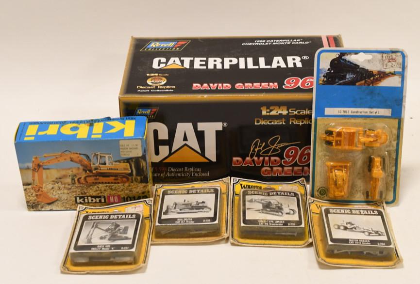 Lot of Caterpillar Train Accessories & Cat Nascar: Nice lot of miscellanious Cat HO scale train accessories. Also comes with a 1/24th scale 1998 Caterpillar Chevrolet Monte Carlo. All display nicely with light wear from storage and dislay.
