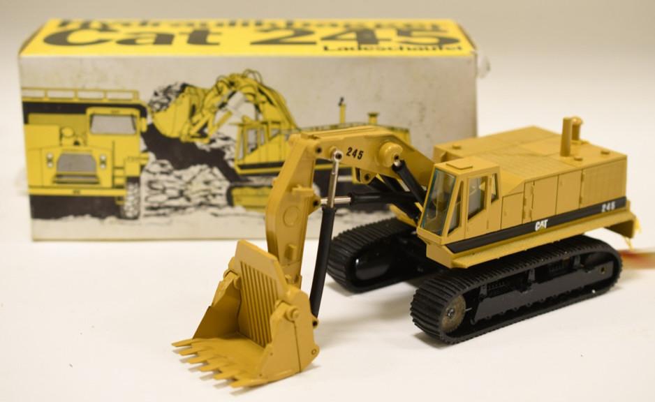 1/50 NZG Conrad Cat 245 Front Shovel Excavator: Nice 1/50 scale Conrad NZG Cat 245 Front Shovel Excavator Displays nicely with box. Toy has been on display so is dusty. Made in Germany.