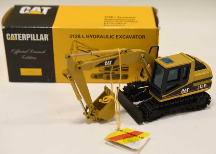 1/50 Conrad NZG Cat 312B L Hydraulic Excavator: Nice 1/50 scale NZG Conrad Cat 312B L Hydraulic Excavator. Displays nicely with light wear from display and age. Nice condition with box.