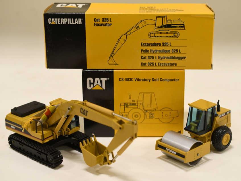 1/50 Conrad NZG Cat Soil Compactor & Excavator: Nice 1/50 scale NZG Conrad Caterpillar Cat CS-583C Vibratory Soil Compactor and Cat 325L Excavator. Both display nicely with the box. They have light wear from display and storage.