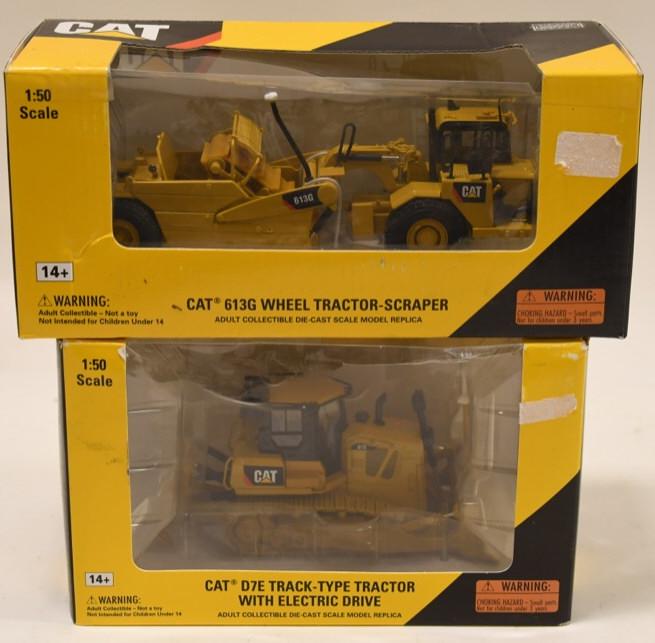 1/50 Norscot Cat Tractor-Scraper & Bulldozer: Nice 1/50 scale die-cast Norscot Cat 613G wheel tractor-scraper and Cat D7E track-type tractor with electric drive. Both are in boxes. Boxes have dust and wear from storage and display.