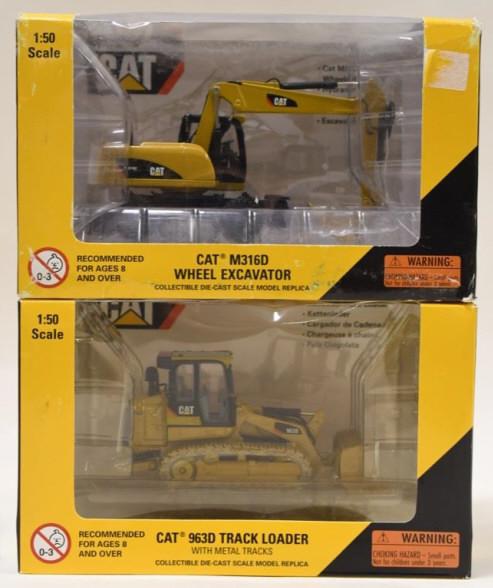 1/50 Norscot Cat Track Loader & Wheel Excavator: Nice 1/50 scale die-cast Norscot Cat M316D Wheel excavator and Cat 963D Track lader with metal tracks. Both are in the boxes. Boxes have dust and wear from storage and display.