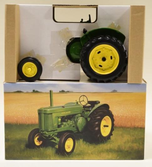 1/16 Ertl John Deere Model "60" Two-Cylinder: Nice 1/16 scale Ertl John Deere model "60" high-seat standard tractor. Two-Cylinder Club Expo XI - 2001 Displays nicely with light wear from display and age.
